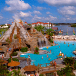Disney’s Polynesian Village Resort pool featuring the iconic lava pool with volcano waterfall, tropical landscaping, and relaxing South Pacific island atmosphere at Walt Disney World
