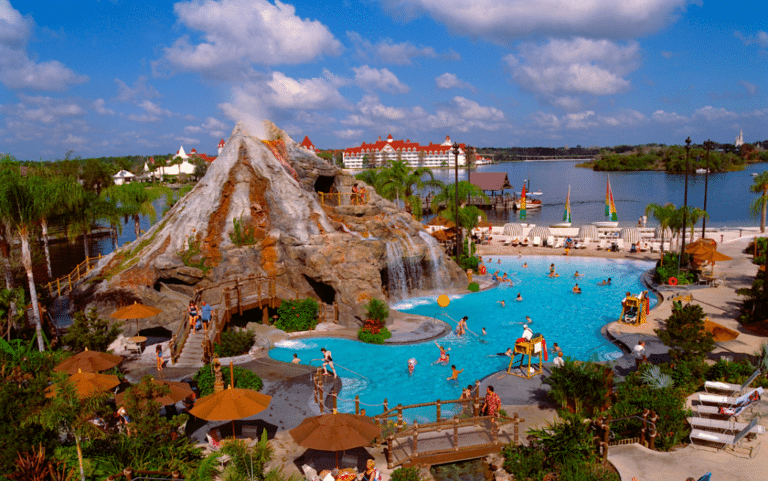 Disney’s Polynesian Village Resort pool featuring the iconic lava pool with volcano waterfall, tropical landscaping, and relaxing South Pacific island atmosphere at Walt Disney World