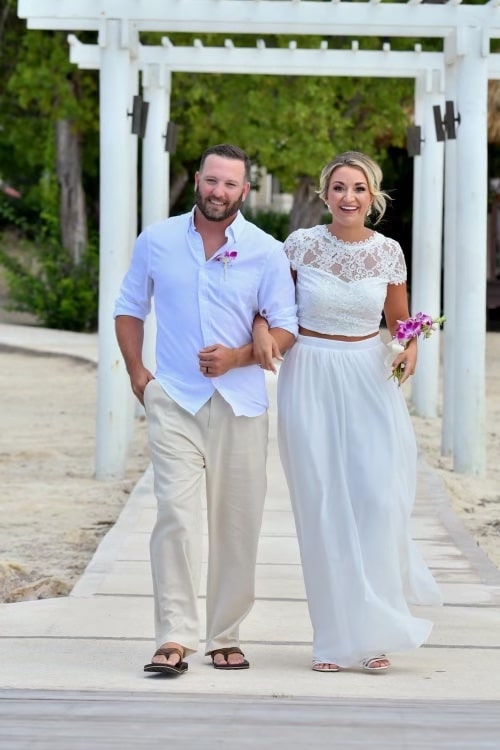 Sandals Dunn’s River wedding ceremony in Jamaica with oceanfront setting and luxury all inclusive resort backdrop