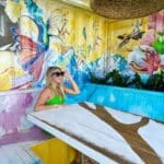 Guest dining at food trucks at Sandals Royal Curaçao colorful outdoor setting