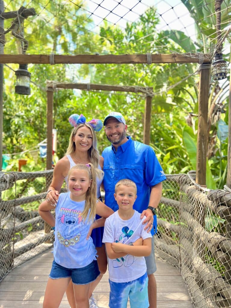 Family smiling at Swiss Family Treehouse in Magic Kingdom at Walt Disney World