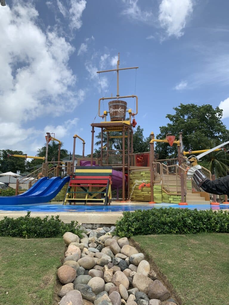 Pirates Island Waterpark at Beaches Negril resort in Jamaica with slides and splash areas for kids and families.