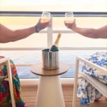 Cheers on disney cruise verandah with friends