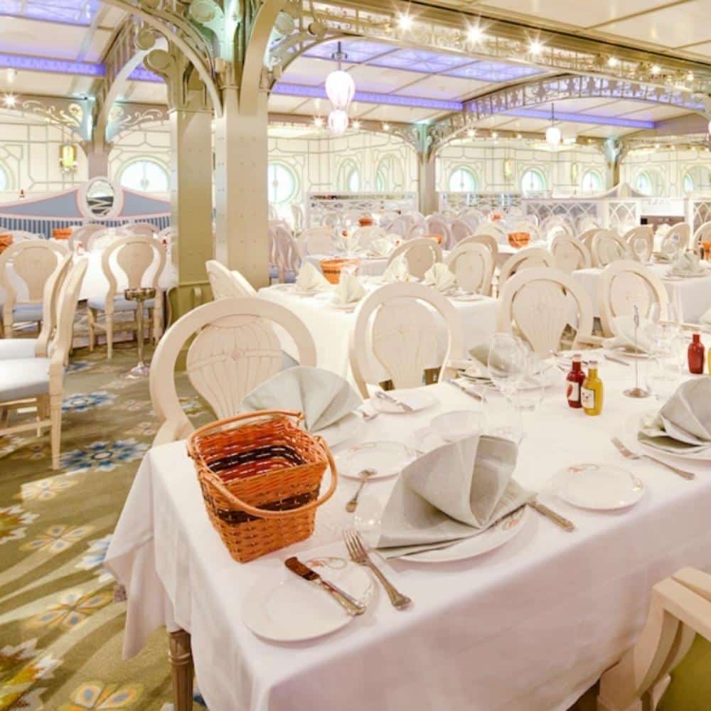 Tiana’s Place restaurant on Disney Cruise Line featuring a lively New Orleans-inspired dining experience with live jazz music, appearances by Princess Tiana and friends, and a menu of Southern and Creole-inspired cuisine aboard the Disney Wonder