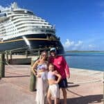 Family enjoying a beach day at Castaway Cay on a Disney Cruise Line vacation.