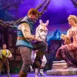 Tangled Broadway-style show on Disney Cruise Line featuring Rapunzel and Flynn Rider on stage