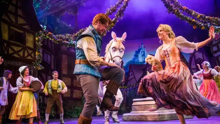 Tangled Broadway-style show on Disney Cruise Line featuring Rapunzel and Flynn Rider on stage