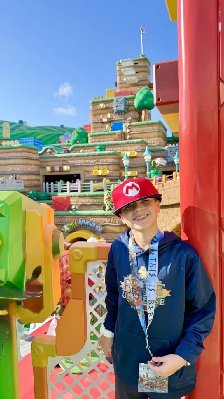 Child enjoying Super Nintendo World at Epic Universe in Universal Orlando.