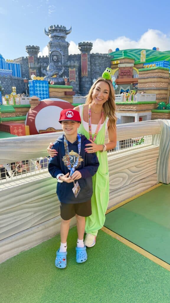 Family enjoying Super Nintendo World at Epic Universe in Universal Orlando theme park.