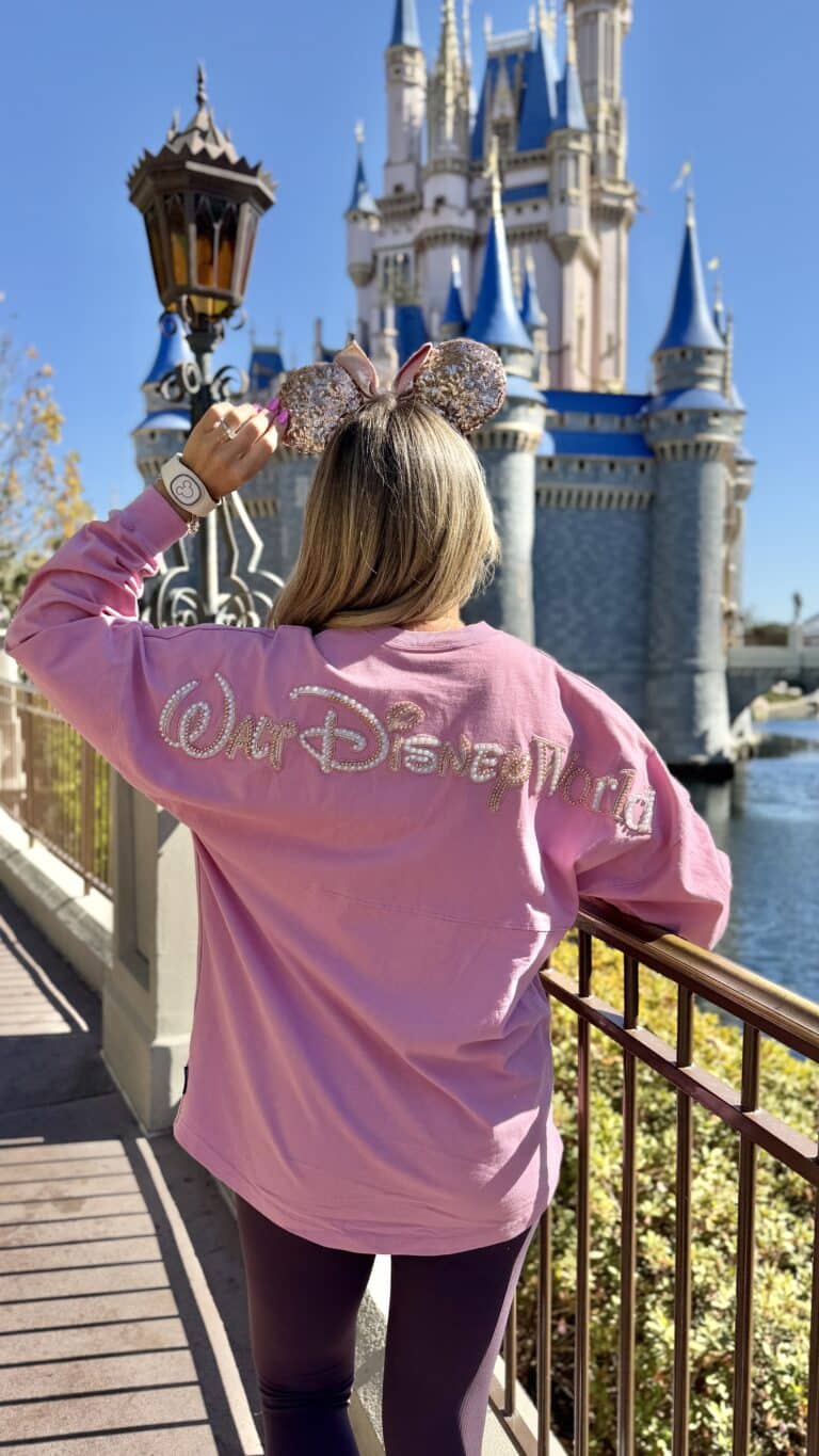 View of Cinderella Castle at Magic Kingdom with travel advisor enjoying Disney World.
