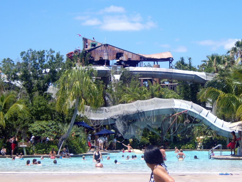 Typhoon Lagoon at Walt Disney World featuring tropical wave pool, sandy beaches, palm trees, and family-friendly water attractions under sunny skies