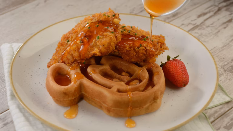 Chicken and waffles with syrup drizzle grand floridian cafe