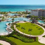 Dreams Playa Mujeres beachfront resort with turquoise Caribbean water and white sand in Cancun