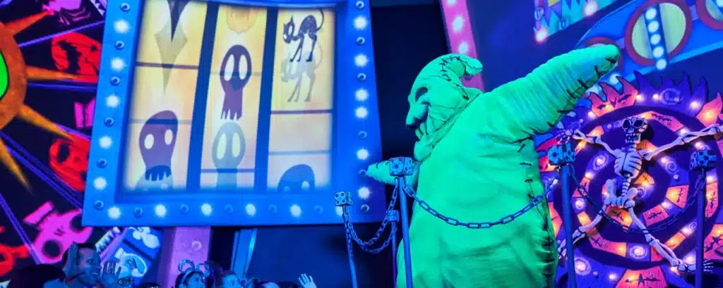 Oogie Boogie Bash Halloween party at Disney California Adventure Park featuring spooky decor, Disney villains, and immersive nighttime entertainment