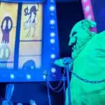 Oogie Boogie Bash Halloween party at Disney California Adventure Park featuring spooky decor, Disney villains, and immersive nighttime entertainment