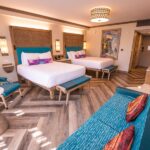 Disney’s Polynesian Village Resort hotel with lagoon views and tropical grounds at Walt Disney World