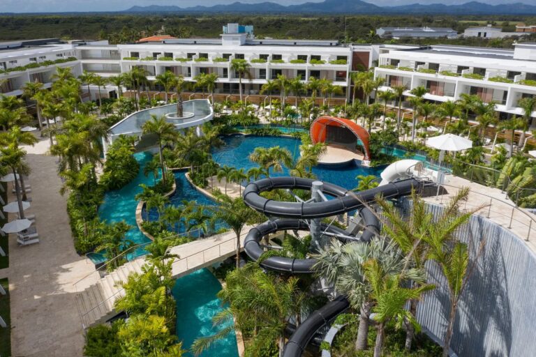 Elevated view of the water park, pools and resort buildings at Dreams Onyx Punta Cana