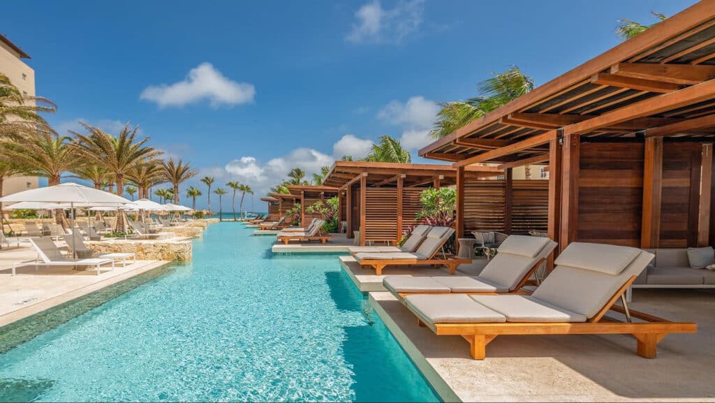 Trankilo adult pool with private cabanas and Caribbean ocean view at Hyatt Regency Aruba Resort Spa and Casino