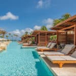 Trankilo adult pool with private cabanas and Caribbean ocean view at Hyatt Regency Aruba Resort Spa and Casino