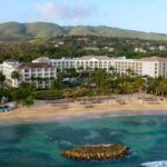 Aerial view of Hyatt Zilara Rose Hall with beachfront resort buildings and Caribbean water in Montego Bay Jamaica