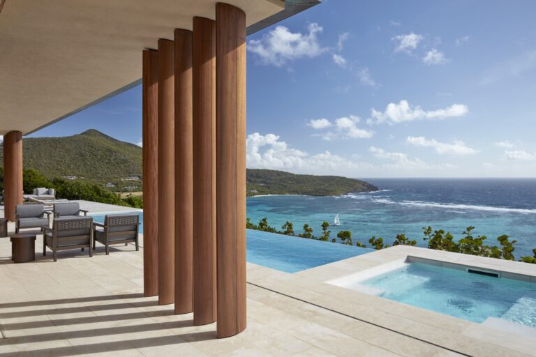 Ocean-facing infinity pool terrace at Mandarin Oriental Canouan overlooking the turquoise Caribbean Sea