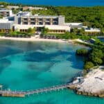 Aerial view of NIZUC Resort & Spa with secluded beaches, turquoise water and resort buildings in Punta Nizuc, Cancun