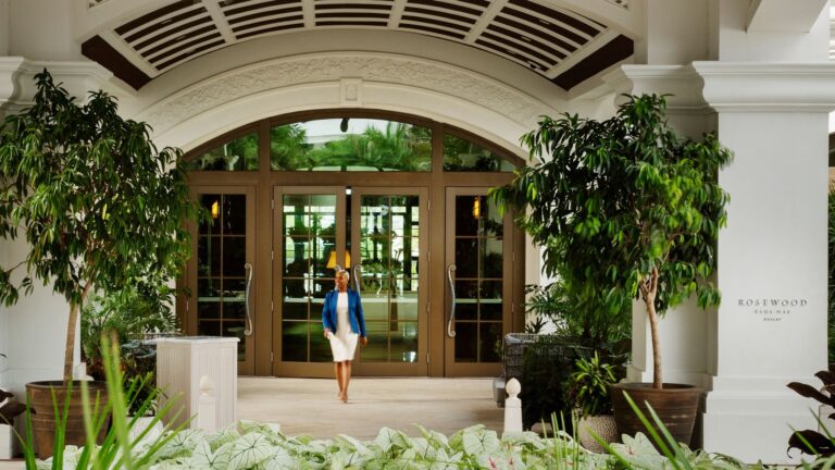 Arched entrance and tropical landscaping at Rosewood Baha Mar in Nassau