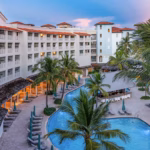 Elevated aerial view of Sandals Barbados resort and pools in St. Lawrence Gap