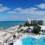 Aerial view of Sandals Royal Bahamian resort, beach and pools in Nassau Bahamas
