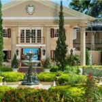 Grand entrance and tropical gardens at Sandals Royal Plantation in Ocho Rios, Jamaica