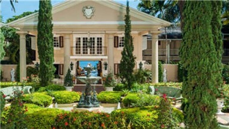 Grand entrance and tropical gardens at Sandals Royal Plantation in Ocho Rios, Jamaica