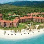 Aerial view of Sandals South Coast along a white-sand beach in Jamaica