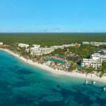 Aerial view of Secrets Akumal Riviera Maya along the Caribbean beachfront in Mexico