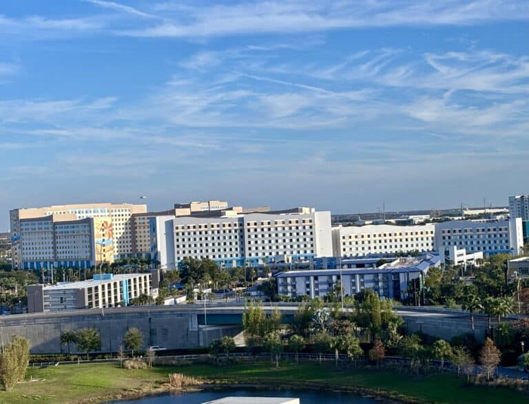 Dockside Inn and Suites resort complex at Universal Orlando Resort under a blue Florida sky