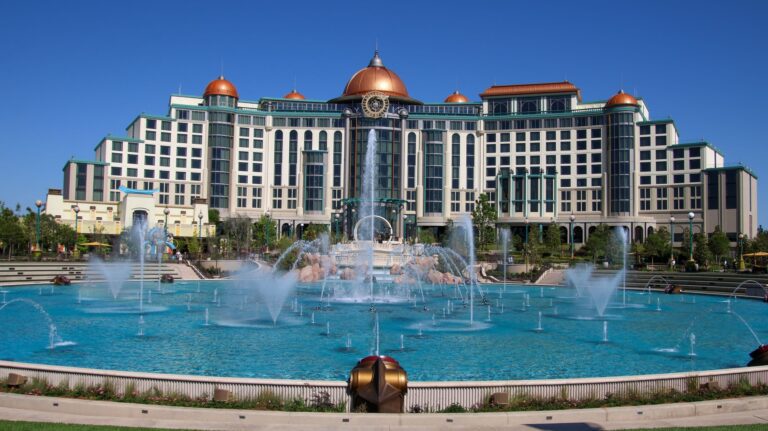 Universal Helios Grand Hotel behind the Cosmos Fountain at Universal Epic Universe in Orlando, Florida