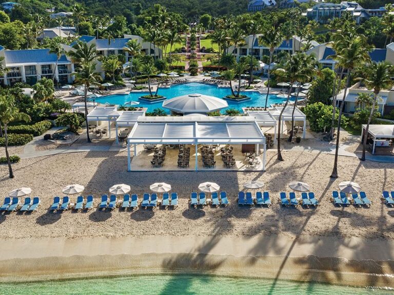 Aerial view of the beachfront pool, palms and villas at The Westin St. John Resort Villas in the U.S. Virgin Islands