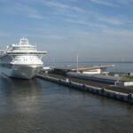 Cruise ship at a passenger port used as neutral cruise comparison context