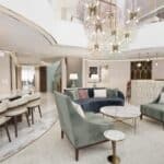 Artist concept of the Believe Tower Suite living room with fireworks-inspired lighting